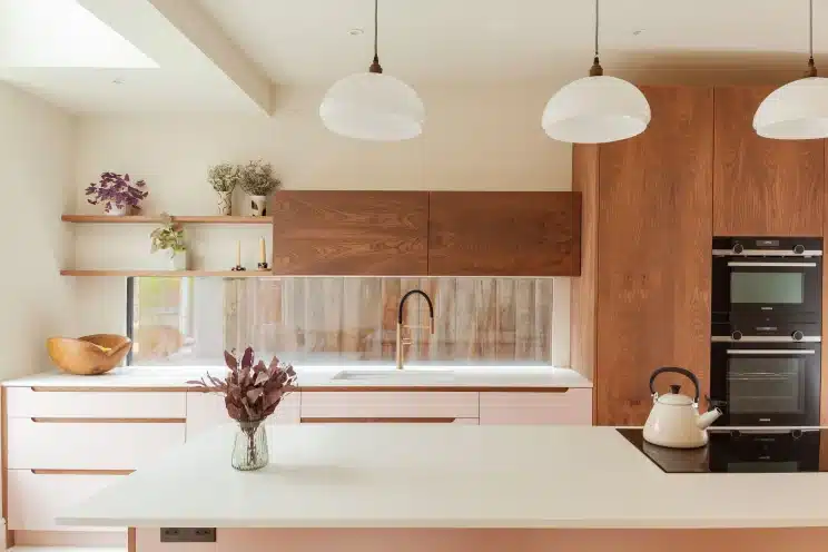 Pink and walnut kitchen